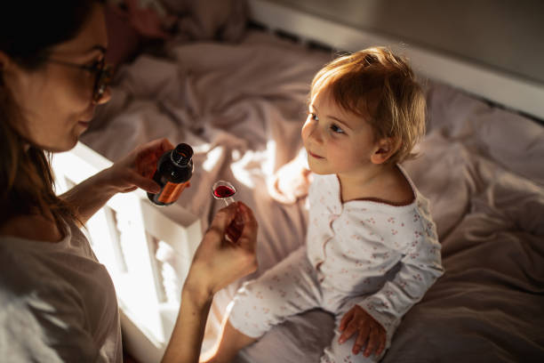 Mother taking care of sick child