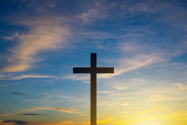 istock The Cross at the sunset background 1370483987