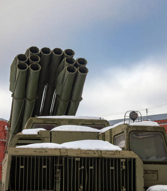 istock Barrels of modern multiple launch rocket system in the parking lot front view. 1370485704
