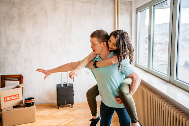 istock Piggyback Ride In A New Apartment 1370487043