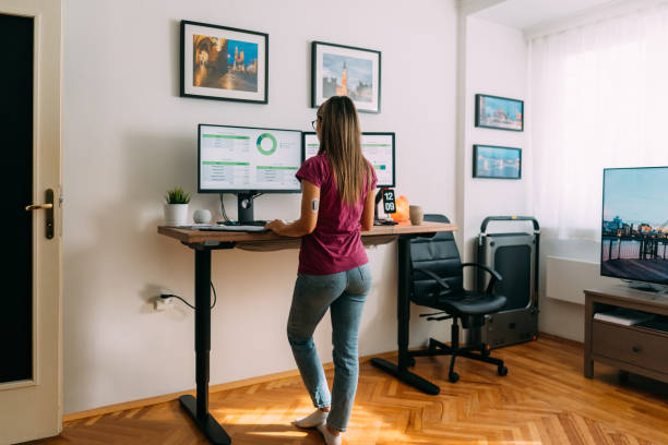 istock Woman with diabetes working at standing desk 1370488699