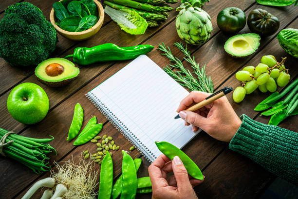 istock Taking notes of the benefits of eating green vegetables 1370489821