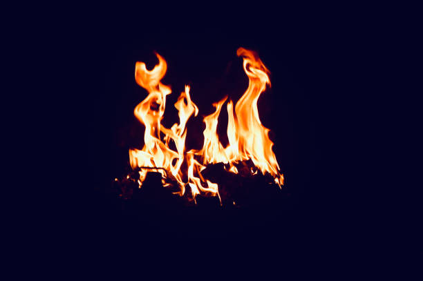 Fire flames in the night unique stock photo Fire flames in the night unique stock photo bonfire isolated stock pictures, royalty-free photos & images