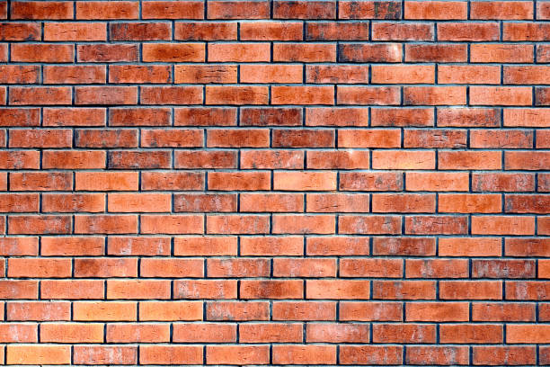 istock Red brick wall of loft building, red grunge brick wall background, loft texture, masonry brickwork 1370496103