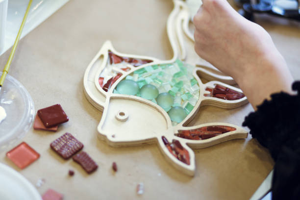 istock The process of creating a fish from a mosaic. 1370497150
