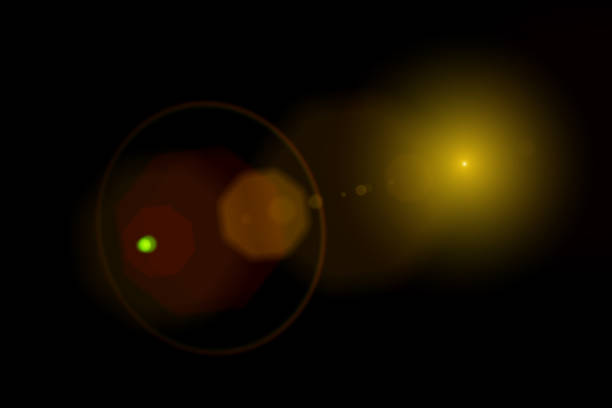 istock Easy to add lens flare effects for overlay designs or screen blending mode to make high-quality images. Abstract sun burst, digital flare, iridescent glare over black background. 1370503122