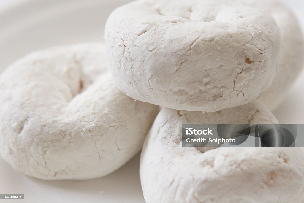 Stack of powdered doughnuts stack of powdered doughnuts on a white plate.  close up view (macro) Baked Pastry Item Stock Photo