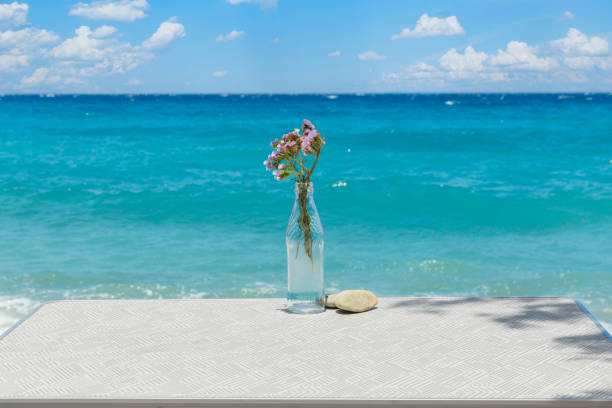 table and flower by the sea