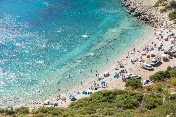 istock people camping and vacationing by the sea 1370504095