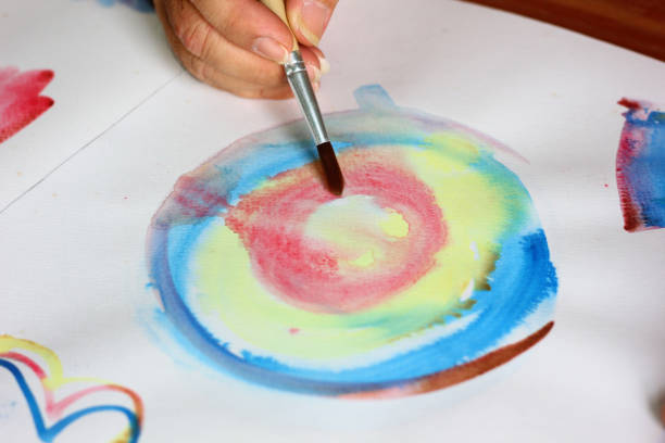the painter painting abstract picture on canvas