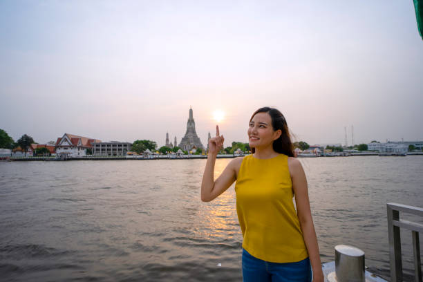 Woman is solo traveller. She is enjoy to explore her world. Asia culture.