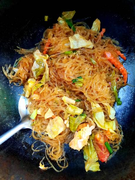istock Cooking Stir fried Rice Noodle with vegetable - food preparation. 1370509549