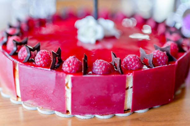 istock Cake with raspberries and chocolate stars 1370509873