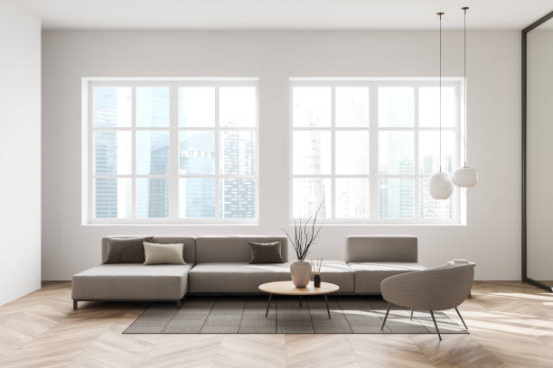 istock Light relaxing room interior with couch and chair, panoramic window 1370510997