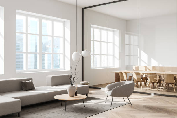 istock Light relaxing room interior with couch and chairs, panoramic window 1370511186