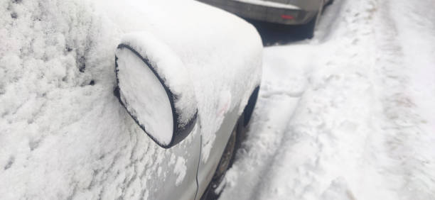 istock The car are completely covered with snow. 1370511500