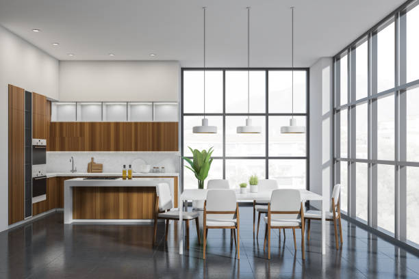istock White and wooden kitchen set interior with dining table and chairs, window 1370511756