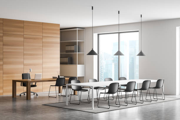 istock White and grey meeting room with office desk 1370513872