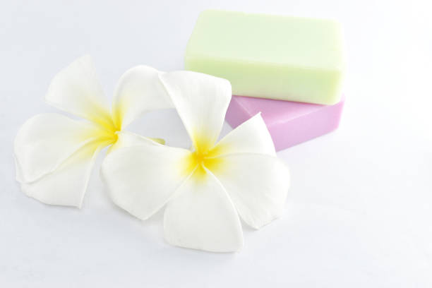 istock natural soap and plumeria on white background. 1370516243