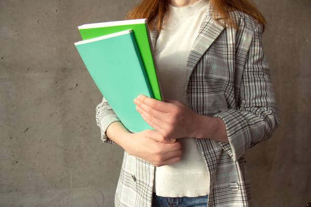 istock Business woman with documents at her workplace 1370520839