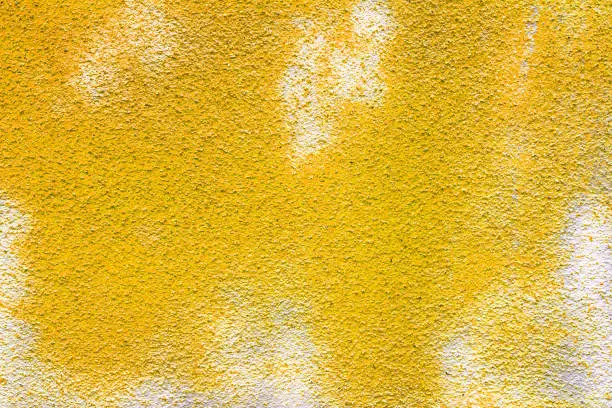 Yellow concrete wall for textures and background