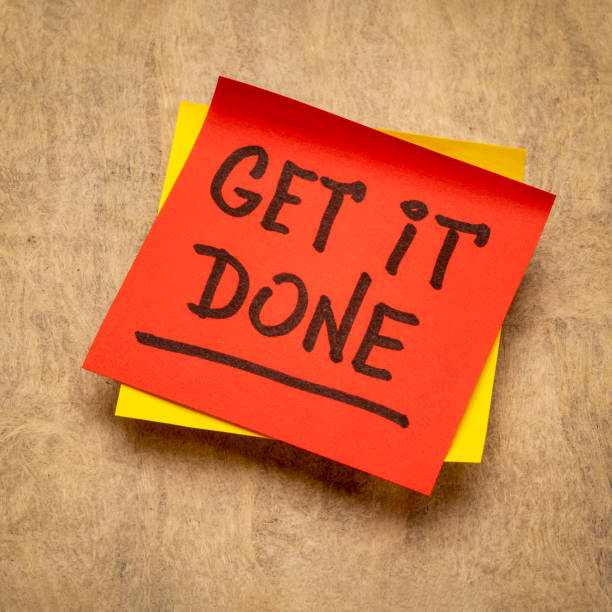 get it done advice or reminder on a sticky note get it done advice or reminder handwriting on a sticky note, business, productivity and personal development concept dillydally stock pictures, royalty-free photos & images