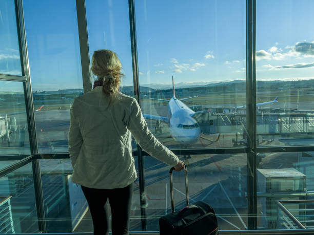 istock Young woman waiting for connecting flight 1370524164