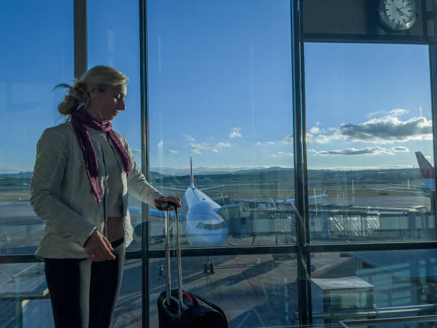 istock Young woman waiting for connecting flight 1370524186