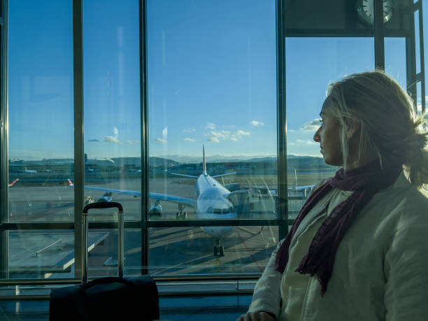 istock Young woman waiting for connecting flight 1370524212
