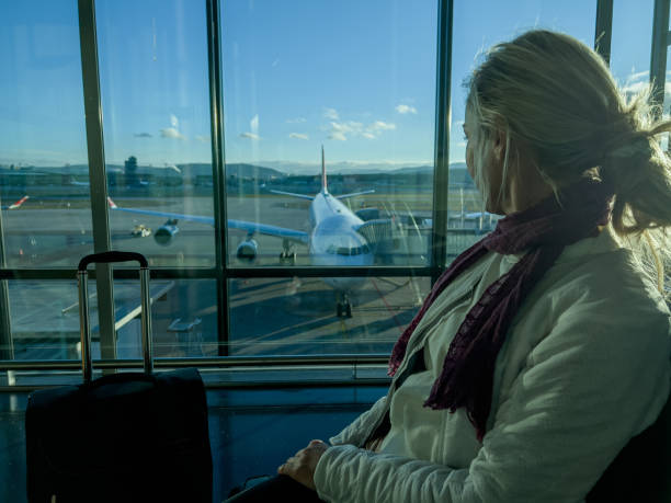 istock Young woman waiting for connecting flight 1370524604