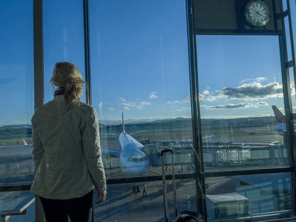 istock Young woman waiting for connecting flight 1370524808