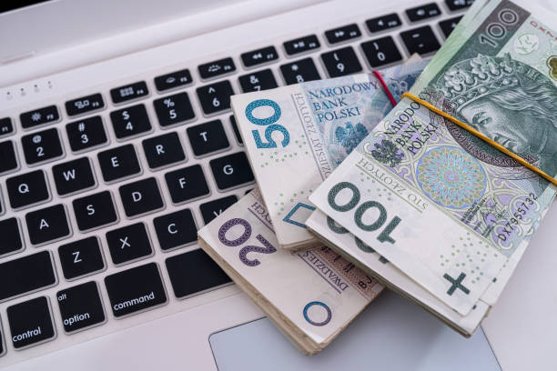 istock pln polish money on white keyboard laptop 1370526360