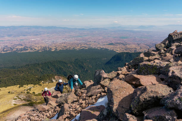 istock Group of hikers on a trail 1370527118