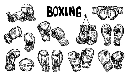 Set boxing gloves hanging on title sketch isolated. Sporting equipments for boxing in hand drawn style. Engraved design for poster, print, book illustration, logo,tattoo. Vintage vector illustration.