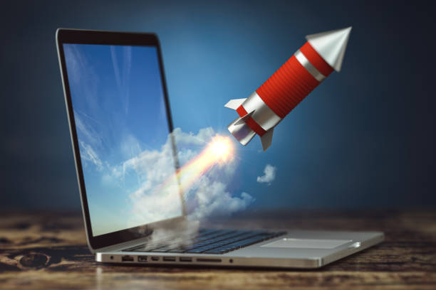 istock Rocket launch from laptop. Launching start up or new business project. 1370527402