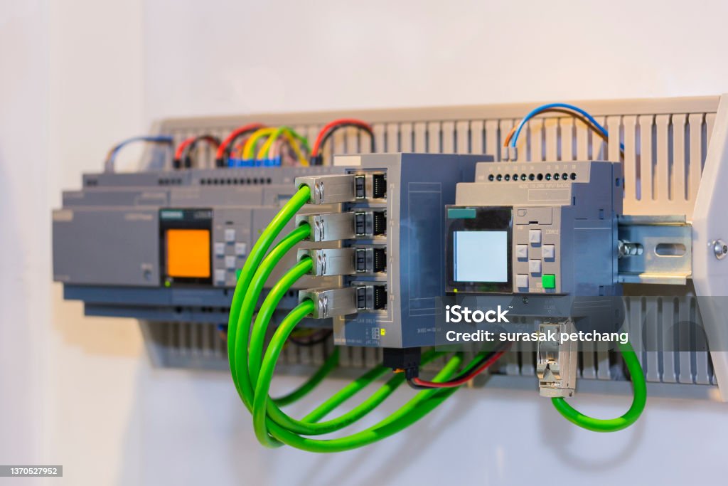automatic Programmable Logic Controller PLC high precision equipment for machine or manufacturing process control in industrial Control Stock Photo