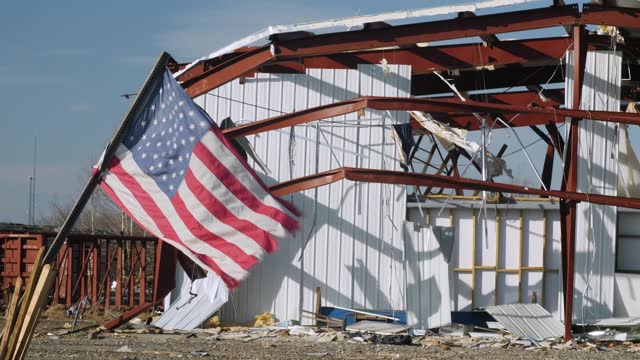 Mayfield Kentucky tornado damage with American Flag