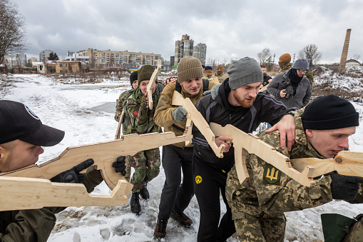 KYIV, UKRAINE - Feb. 12, 2022: Territorial defense exercises amid the threat of a Russian military invasion of Ukraine. Military exercises for civilians in Kyiv, Ukraine