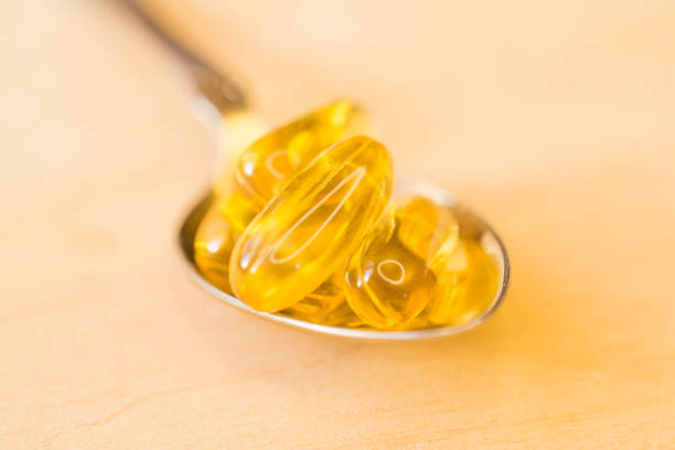 istock omega 3 vitamins yellow capsules close 1370535152