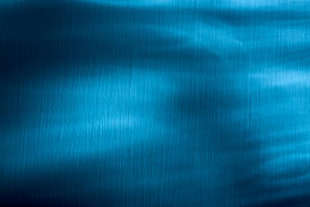 istock Blue color background. Awesome abstract blur texture for website mockup. Blurred beams, light rays. Water wallpaper. Art decor. Waves pattern. Swimming or spa design concept. Business card template 1370536432