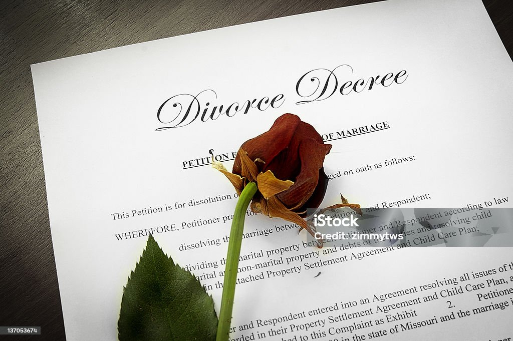 Divorce decree Divorce Decree document with a dead rose Conflict Stock Photo