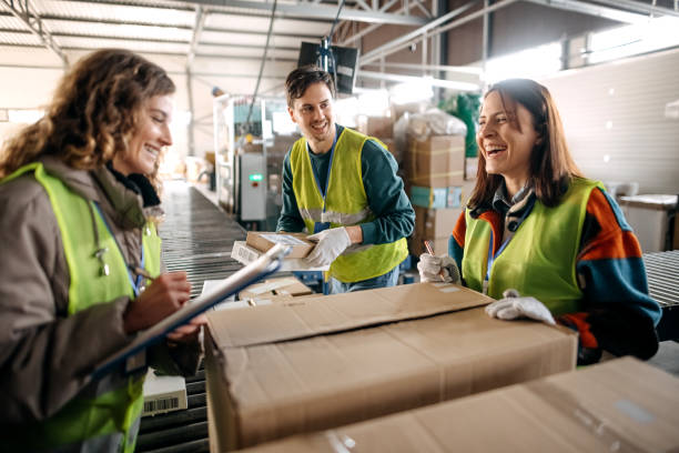 istock Male and female workers at distribution center 1370537248