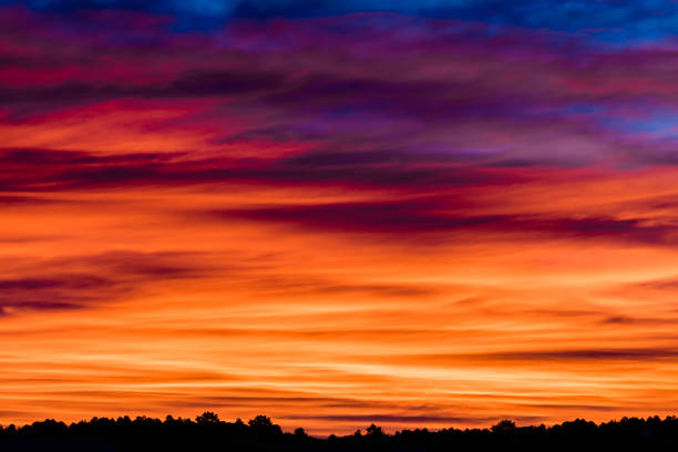 istock Spectacular Sunrise with Red and Orange Streaks 1370538707