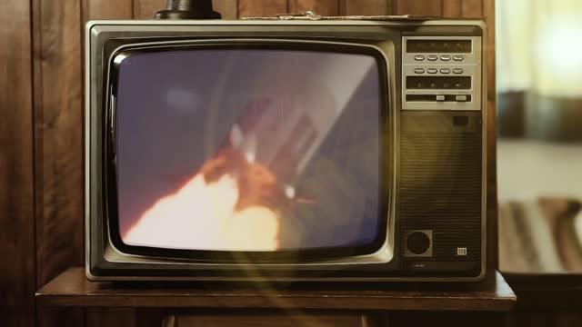 1969. Historical Footage of the Saturn V Rocket Launch of Apollo 11 Mission to the Moon, On an Old Retro TV. Elements of this video furnished by NASA.
