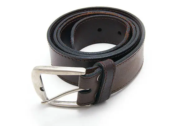 men's brown leather belt, coiled up on white