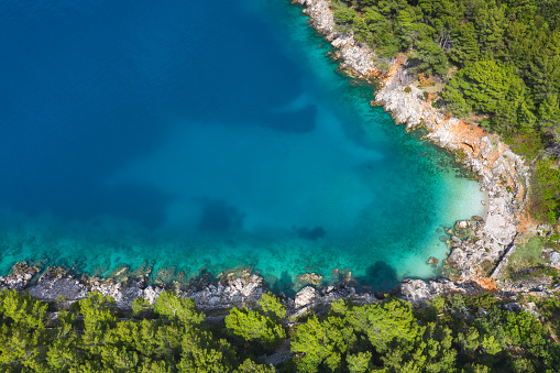 Aerial view on idyllic small cove on Hvar island (Croatia). Drone point of view.