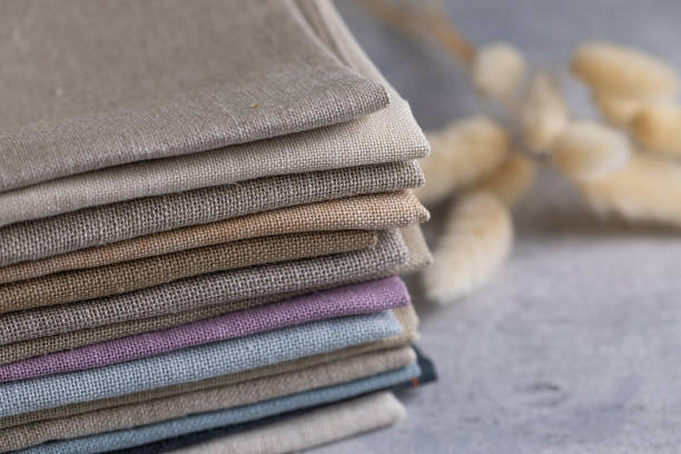 istock A pile of four folded dull-colored natural linen fabric 1370540339