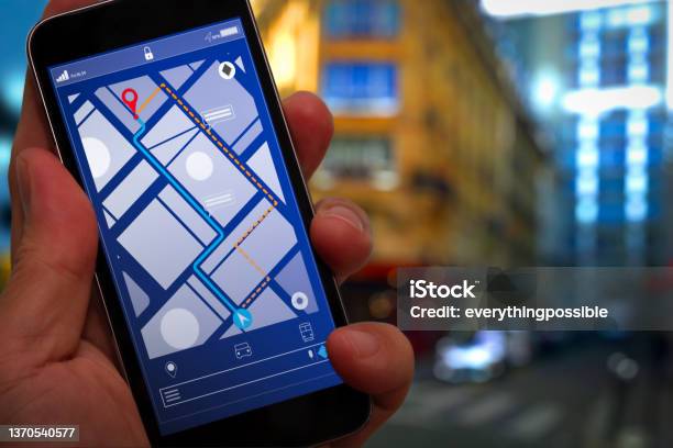 Close Up Of Tourist Using Gps Map Navigation On Smartphone Application Screen For Direction To Destination Address In The City With Travel And Technology Concept Stock Photo - Download Image Now