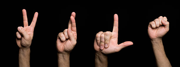 langue des signes & methaphoric symboles. - letter l human hand human finger human thumb photos et images de collection
