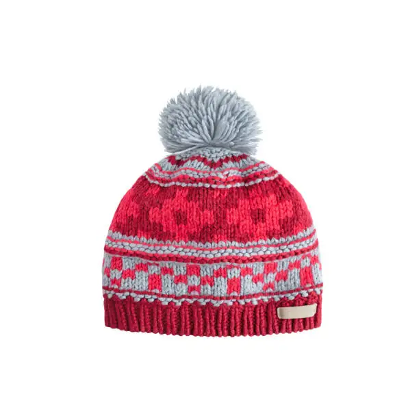 Knit beanie cap with pompom isolated on white. Winter clothes